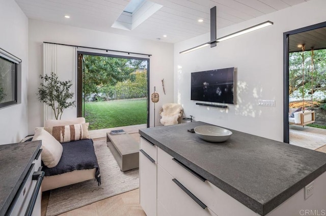 132628 Rainbow Ridge Ln, Encinitas, CA 92024 - living room with a skylight, plenty of natural light, and recessed lighting