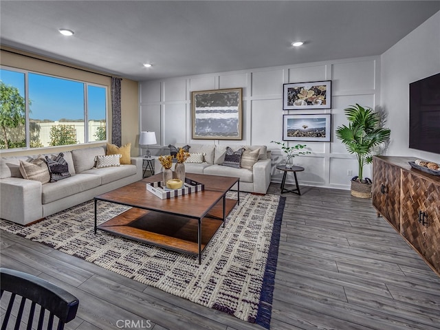 35368 Garcia St, Beaumont, CA 92223 - living room with wood finished floors, recessed lighting, and a decorative wall