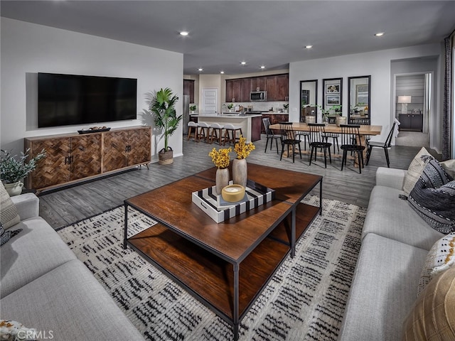 35368 Garcia St, Beaumont, CA 92223 - living area featuring baseboards, wood finished floors, and recessed lighting