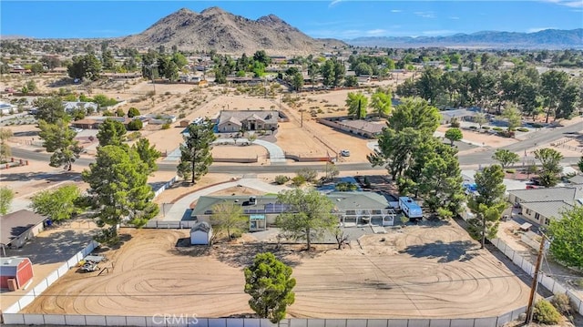 birds eye view of property with a residential view and a mountain view