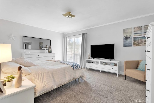 bedroom featuring crown molding, carpet, and baseboards