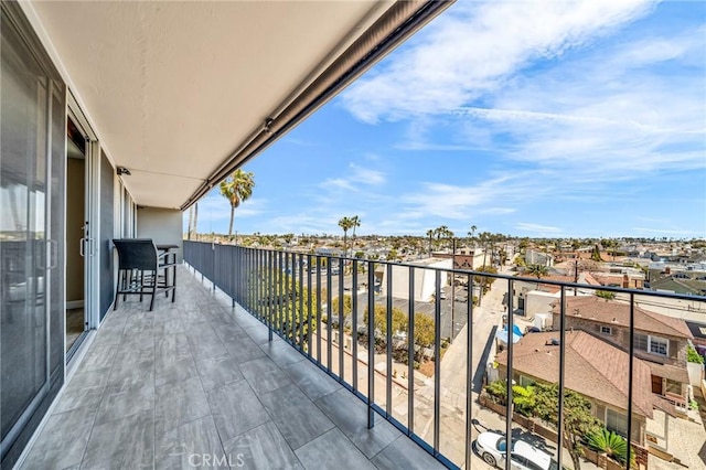 balcony featuring a residential view