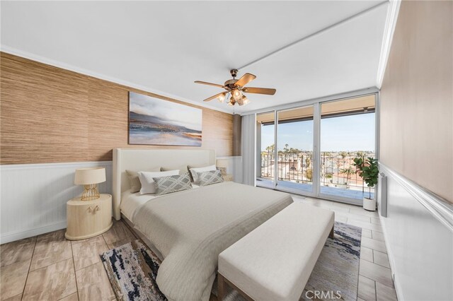 bedroom featuring ceiling fan and access to outside
