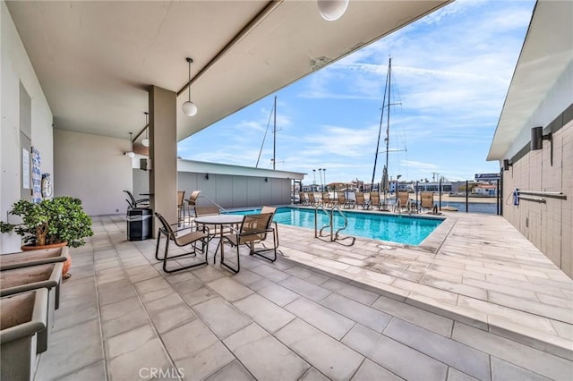 community pool with a patio