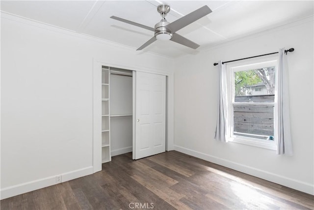415 7th, Paso Robles, CA 93446 - unfurnished bedroom with ornamental molding, dark wood-style floors, a closet, and baseboards