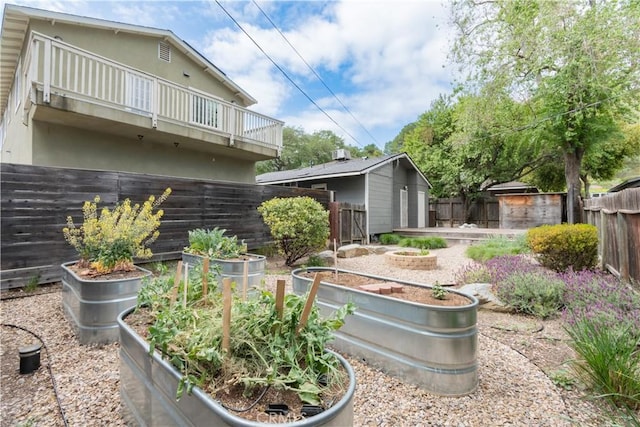 415 7th, Paso Robles, CA 93446 - view of yard with an outdoor structure, a storage shed, a garden, and a fenced backyard