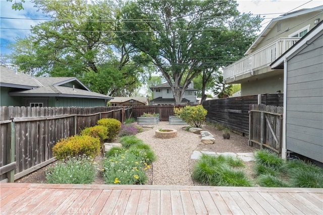 415 7th, Paso Robles, CA 93446 - view of yard featuring a wooden deck and a fenced backyard