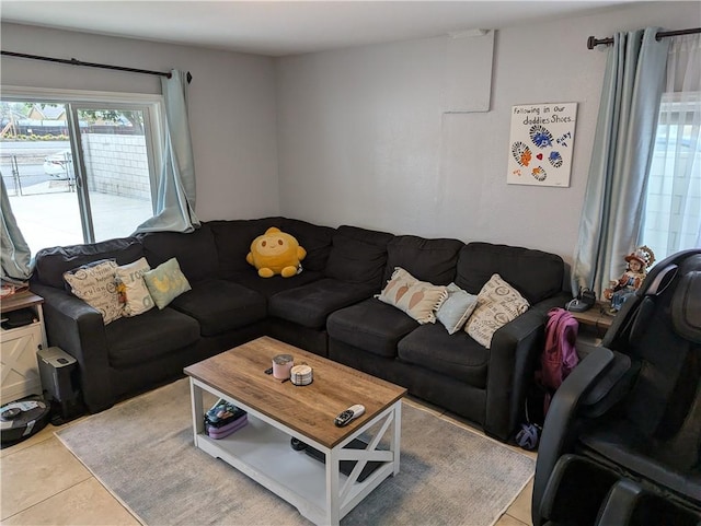 living area with light tile patterned floors