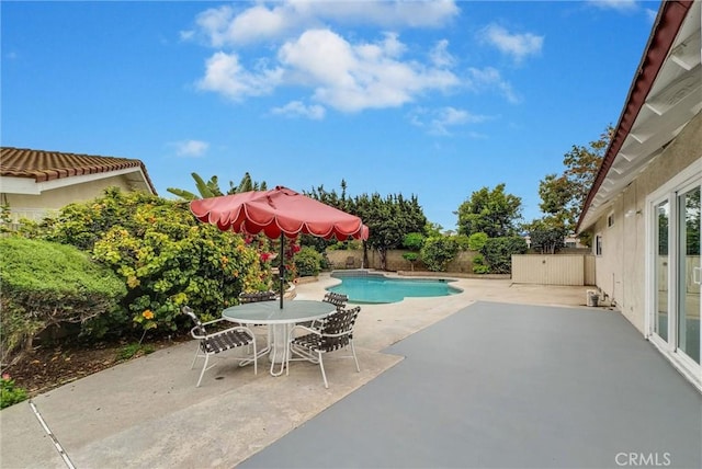 view of pool with a fenced backyard, a patio area, and a fenced in pool