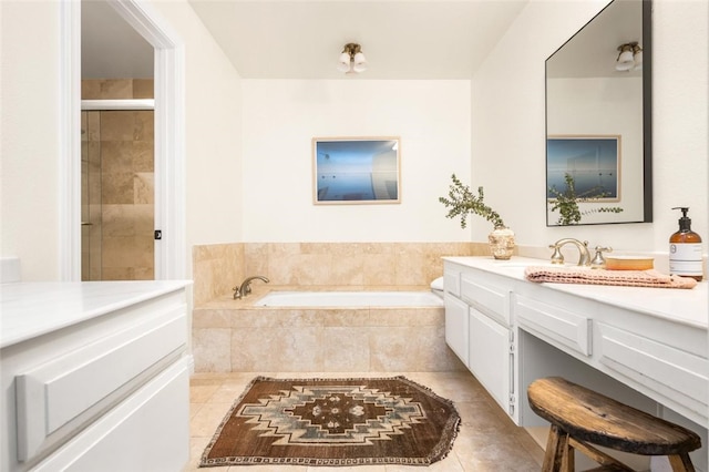 4050 Via Dolce Unit 241, Marina Del Rey, CA 90292 - bathroom featuring a garden tub, tile patterned flooring, vanity, and a tile shower