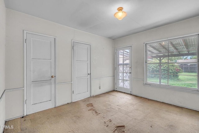 unfurnished bedroom featuring carpet flooring