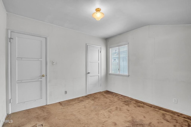 unfurnished room with carpet floors