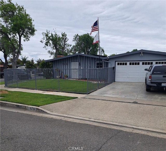 1230 Kilson Dr, Santa Ana, CA 92707 - ranch-style house with concrete driveway, an attached garage, and a fenced front yard