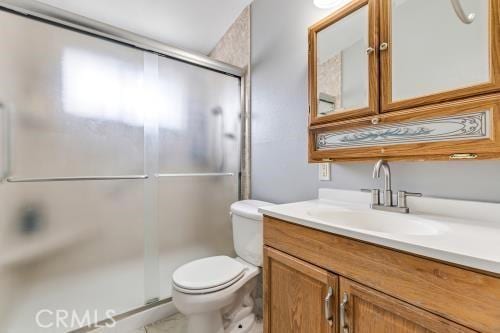 1230 Kilson Dr, Santa Ana, CA 92707 - full bath featuring vanity and a shower with door