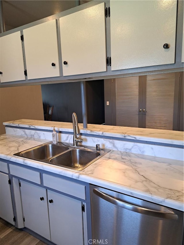 1230 Kilson Dr, Santa Ana, CA 92707 - kitchen featuring dishwasher, light countertops, and dark wood-style flooring