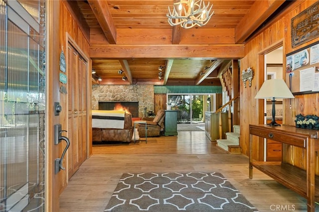 693 Old Meadow Pl, Lake Arrowhead, CA 92352 - interior space featuring beam ceiling, wooden ceiling, wood finished floors, and an inviting chandelier