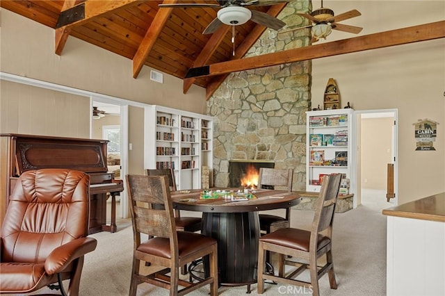 693 Old Meadow Pl, Lake Arrowhead, CA 92352 - carpeted dining space featuring visible vents, beam ceiling, ceiling fan, and wood ceiling