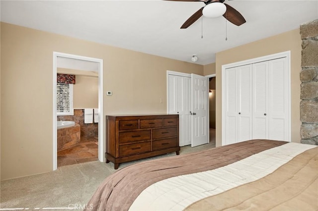 693 Old Meadow Pl, Lake Arrowhead, CA 92352 - carpeted bedroom with two closets, ceiling fan, and connected bathroom
