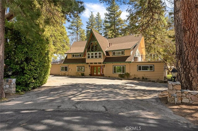 693 Old Meadow Pl, Lake Arrowhead, CA 92352 - view of front of property with driveway, french doors, and a balcony