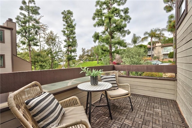 view of patio featuring a balcony