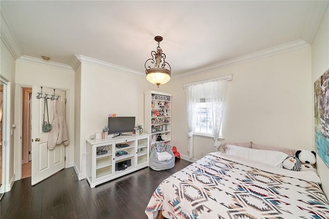 1961 W Snead St, La Habra, CA 90631 - bedroom with crown molding, dark wood-type flooring, and baseboards