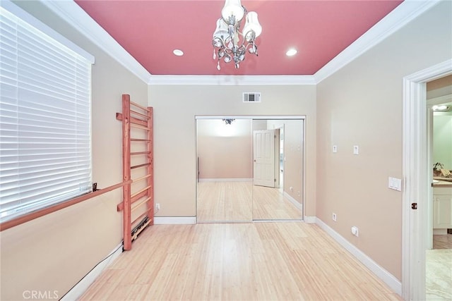 1961 W Snead St, La Habra, CA 90631 - hall with a chandelier, wood finished floors, crown molding, baseboards, and recessed lighting