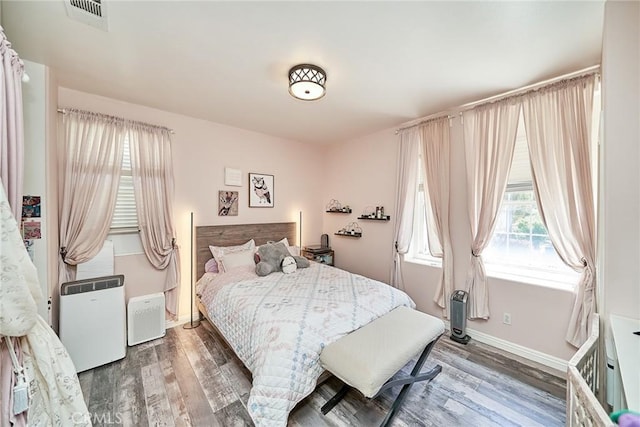 1961 W Snead St, La Habra, CA 90631 - bedroom featuring wood finished floors and baseboards