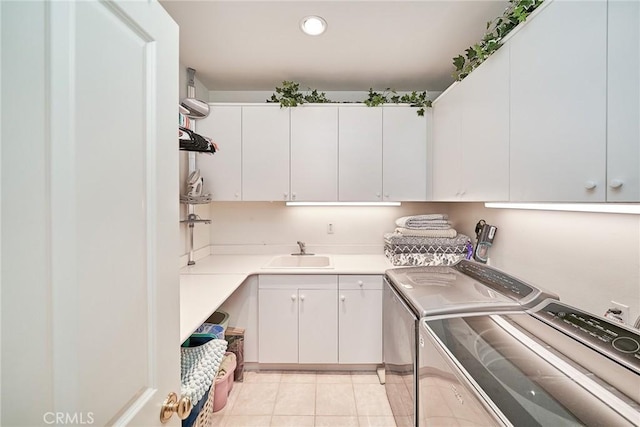 1961 W Snead St, La Habra, CA 90631 - laundry room featuring cabinet space, independent washer and dryer, and light tile patterned floors