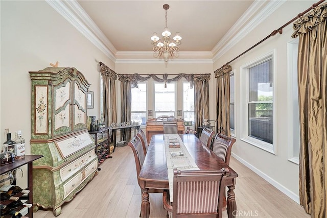 1961 W Snead St, La Habra, CA 90631 - dining area with a chandelier, ornamental molding, and light wood-type flooring