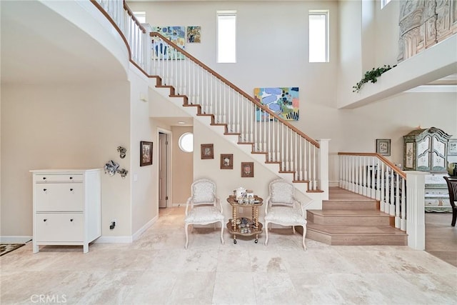 1961 W Snead St, La Habra, CA 90631 - entryway with a towering ceiling, stairway, and baseboards