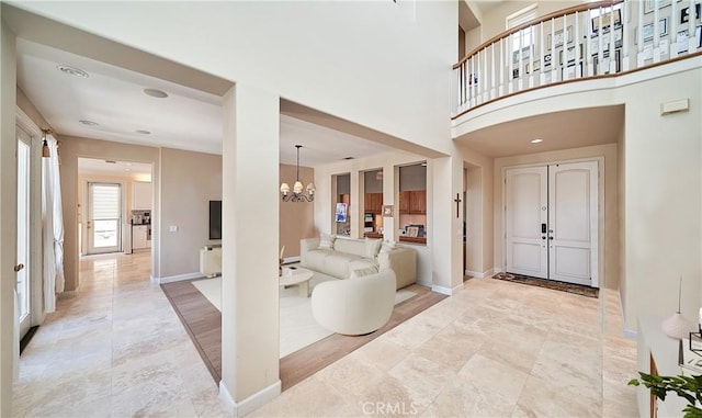 1961 W Snead St, La Habra, CA 90631 - entrance foyer featuring a chandelier and baseboards