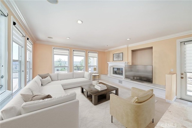 1961 W Snead St, La Habra, CA 90631 - living room featuring crown molding, healthy amount of natural light, a glass covered fireplace, recessed lighting, and baseboards