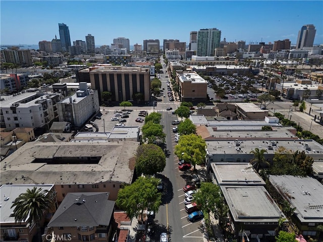 birds eye view of property featuring a city view