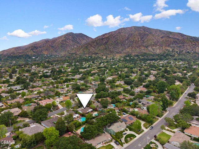 drone / aerial view featuring a mountain view