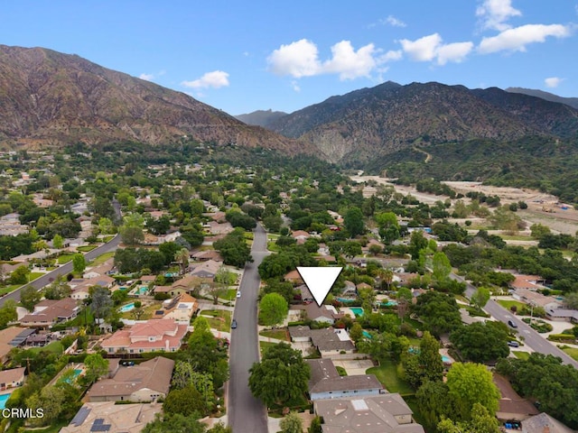 drone / aerial view featuring a mountain view and a residential view
