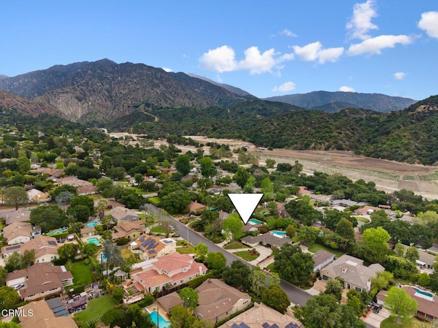 bird's eye view with a residential view and a mountain view