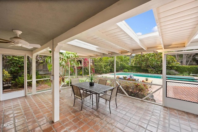 view of patio / terrace featuring a ceiling fan, outdoor dining area, an outdoor pool, and fence