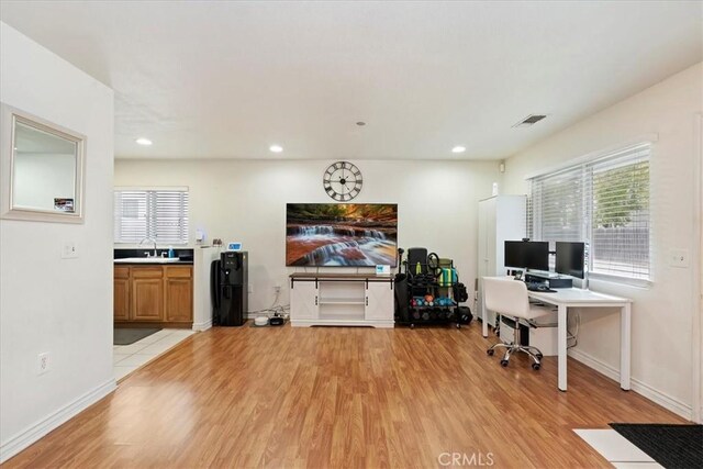 4423 N Sunflower Ave, Covina, CA 91724 - office featuring light wood finished floors, baseboards, visible vents, and recessed lighting