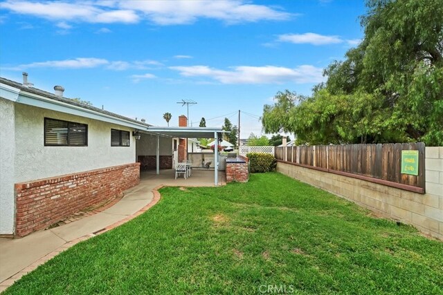 4423 N Sunflower Ave, Covina, CA 91724 - view of yard with a patio area and a fenced backyard