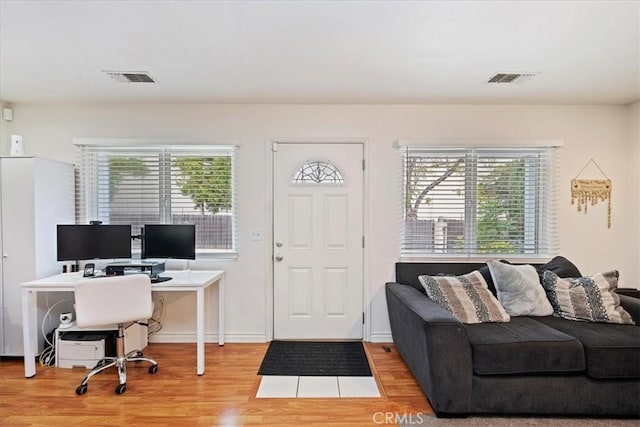 4423 N Sunflower Ave, Covina, CA 91724 - office featuring wood finished floors, a healthy amount of sunlight, and visible vents