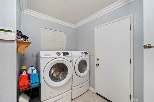 4423 N Sunflower Ave, Covina, CA 91724 - clothes washing area with light tile patterned floors, washer and clothes dryer, laundry area, and ornamental molding