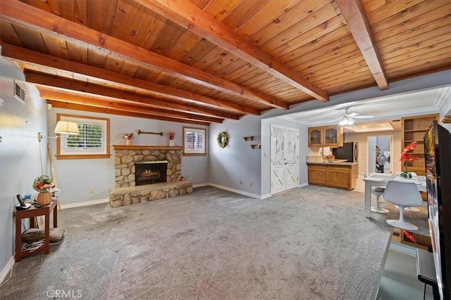 4423 N Sunflower Ave, Covina, CA 91724 - unfurnished living room with light carpet, baseboards, visible vents, beamed ceiling, and wood ceiling