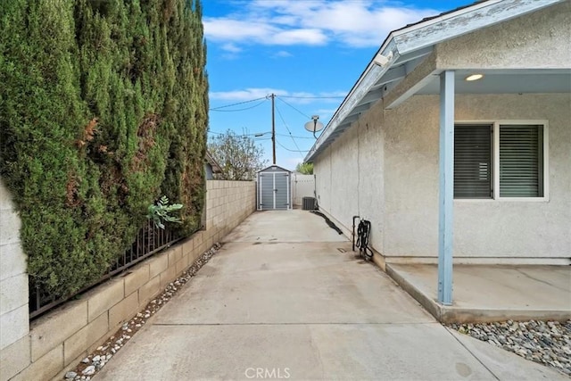 4423 N Sunflower Ave, Covina, CA 91724 - view of home's exterior with stucco siding, an outbuilding, a patio, and a storage shed