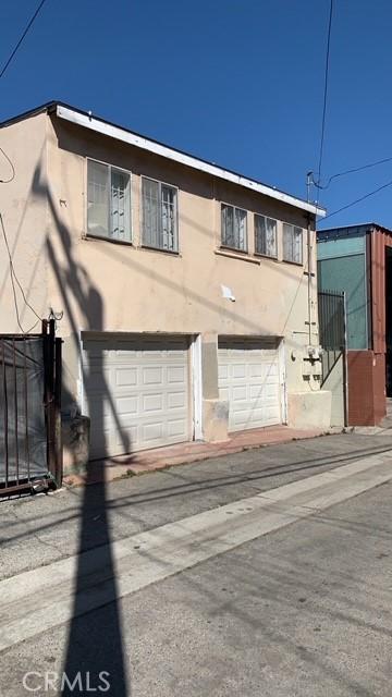 3940 City Terrace Dr, Los Angeles, CA 90063 - view of property exterior with stucco siding and a garage
