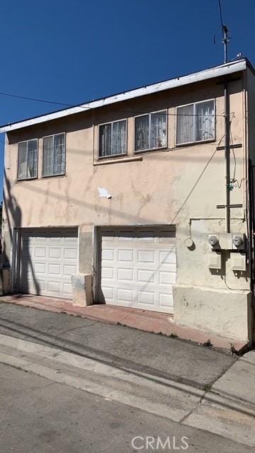 3940 City Terrace Dr, Los Angeles, CA 90063 - view of front of home with a garage and stucco siding