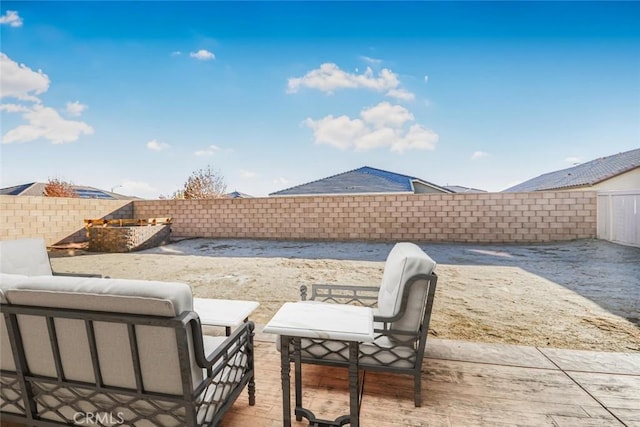 view of patio featuring a fenced backyard