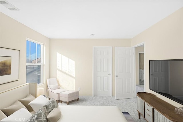 interior space featuring baseboards and visible vents