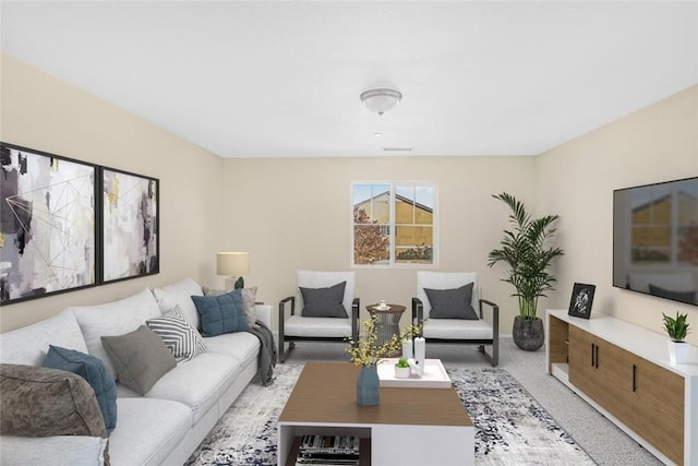 living area with baseboards and light colored carpet