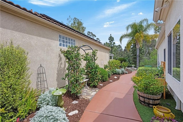 40310 Via Tonada, Murrieta, CA 92562 - view of home's exterior featuring stucco siding and fence