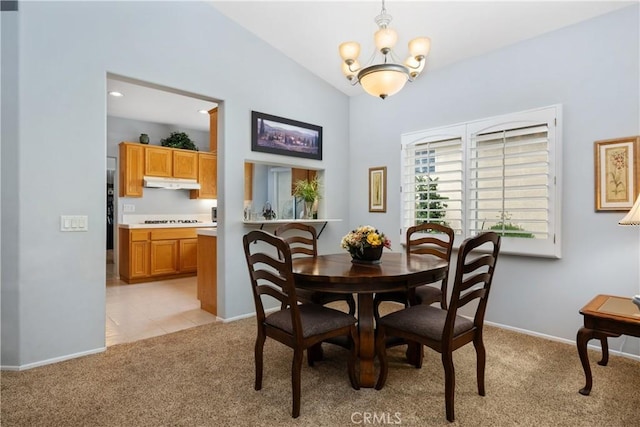 40310 Via Tonada, Murrieta, CA 92562 - dining room featuring lofted ceiling, light carpet, baseboards, and a chandelier
